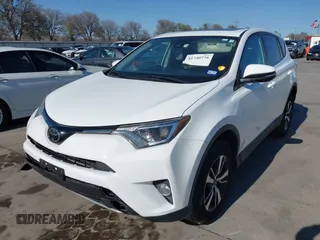 2018 Toyota RAV4 XLE z VIN 2T3WFREV3JW483398, wystawiony jako IAAI lot #41740776 z przebiegiem 70 640 mil mil oraz . Historia ofert i sprzedaży dostępna na DreamBid. Obrazek 21.