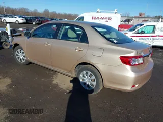 2011 Toyota Corolla L with VIN 2T1BU4EE3BC715128, listed as a IAAI auction lot 41806425 with 162,740 mi miles. Bid and sale history available at carsss.com. Image 3.