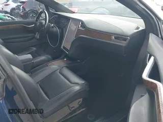 2016 Tesla Model X 70D z VIN 5YJXCBE29GF018794, wystawiony jako IAAI lot #42129574 z przebiegiem 51 814 mil mil oraz . Historia ofert i sprzedaży dostępna na DreamBid. Obrazek 5.
