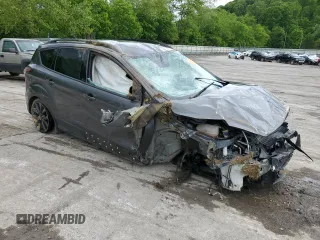2017 Ford Escape SE z VIN 1FMCU9GD7HUB76204, wystawiony jako Copart lot #58334725 z przebiegiem Nie podano mil oraz Szkoda całkowita • Salvage title. Historia ofert i sprzedaży dostępna na DreamBid. Obrazek 4.