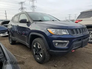 2018 Jeep Compass Trailhawk with VIN 3C4NJDDB5JT112495, listed as a Copart auction lot 44628635 with 62,882 mi miles and Salvage Title. Bid and sale history available at carsss.com. Image 4.