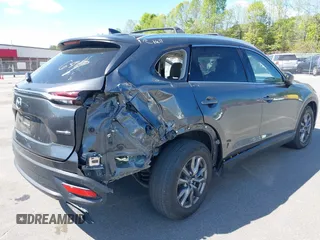 2021 Mazda CX-9 Touring with VIN JM3TCACY7M0503484, listed as a IAAI auction lot 42013262 with 63,777 mi miles and . Bid and sale history available at DreamBid. Image 6.