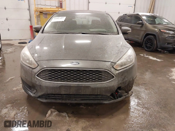 2015 Ford Focus SE with VIN 1FADP3F2XFL342480, listed as a IAAI auction lot 41607487 with 103,530 mi miles. Bid and sale history available at carsss.com. Image 6.