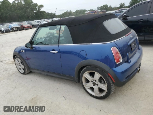 2007 MINI Convertible S with VIN WMWRH33567TJ45123, listed as a Copart auction lot 55702735 with 60,117 mi miles and Salvage title. Bid and sale history available at DreamBid. Image 2.