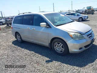2006 Honda Odyssey EX-L with VIN 5FNRL38726B424923, listed as a IAAI auction lot 42099212 with 171,749 mi miles. Bid and sale history available at carsss.com. Image 1.