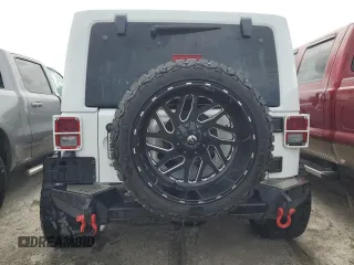 2018 Jeep Wrangler JK Unlimited Sport S with VIN 1C4BJWDG2JL809600, listed as a Copart auction lot 76384474 with 0 mi miles and Non Repairable. Bid and sale history available at carsss.com. Image 6.