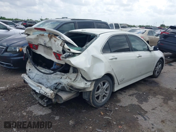 2006 Acura TSX Navi with VIN JH4CL96906C023878, listed as a IAAI auction lot 42128379 with 255,591 mi miles and . Bid and sale history available at DreamBid. Image 4.