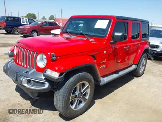 2019 Jeep Wrangler Unlimited Sahara with VIN 1C4HJXEN8KW591398, listed as a IAAI auction lot 42045071 with 87,410 mi miles and . Bid and sale history available at DreamBid. Image 2.
