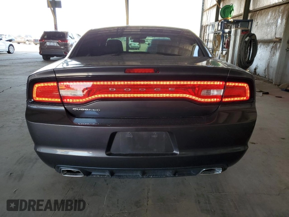 2013 Dodge Charger SE z VIN 2C3CDXBG4DH735185, wystawiony jako Copart lot #56763685 z przebiegiem 119 640 mil mil oraz Szkody całkowita. Historia ofert i sprzedaży dostępna na DreamBid. Obrazek 6.