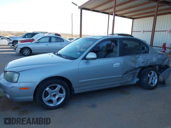 2003 Hyundai Elantra GLS z VIN KMHDN45D43U552485, wystawiony jako IAAI lot #41680449 z przebiegiem 127 899 mil mil oraz . Historia ofert i sprzedaży dostępna na DreamBid. Obrazek 14.