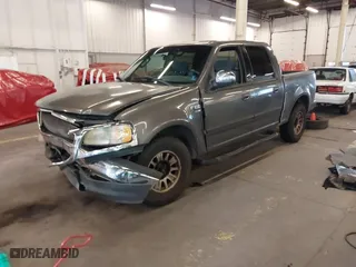 2002 Ford F-150 XLT with VIN 1FTRW07L22KE34627, listed as a IAAI auction lot 40813779 with 194,156 mi miles. Bid and sale history available at carsss.com. Image 17.