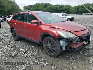 2015 Mazda CX-9 Grand Touring z VIN JM3TB3DV0F0461438, wystawiony jako Copart lot #61615275 z przebiegiem 212 252 mil mil oraz Szkoda całkowita • Salvage title. Historia ofert i sprzedaży dostępna na DreamBid. Obrazek 4.