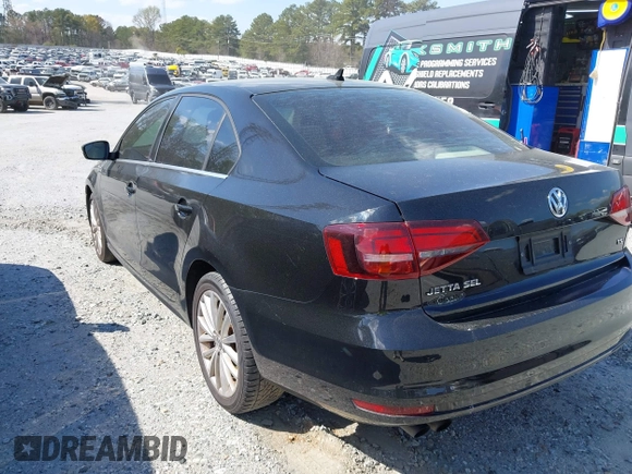 2016 Volkswagen Jetta Sedan 1.8T SEL with VIN 3VWL07AJ5GM263893, listed as a IAAI auction lot 41715603 with 188,778 mi miles. Bid and sale history available at carsss.com. Image 3.