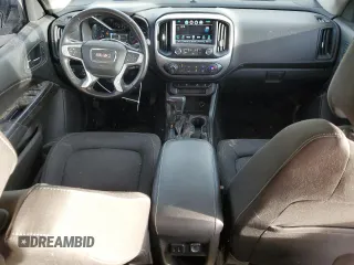 2017 GMC Canyon 4WD SLE z VIN 1GTG6CENXH1143837, wystawiony jako Copart lot #49699225 z przebiegiem 78 865 mil mil oraz Szkody całkowita. Historia ofert i sprzedaży dostępna na DreamBid. Obrazek 8.