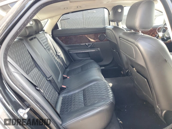 2016 Jaguar XJ Portfolio with VIN SAJWJ2GD8G8V92997, listed as a Copart auction lot 72420774 with 74,934 mi miles and Salvage title. Bid and sale history available at DreamBid. Image 10.