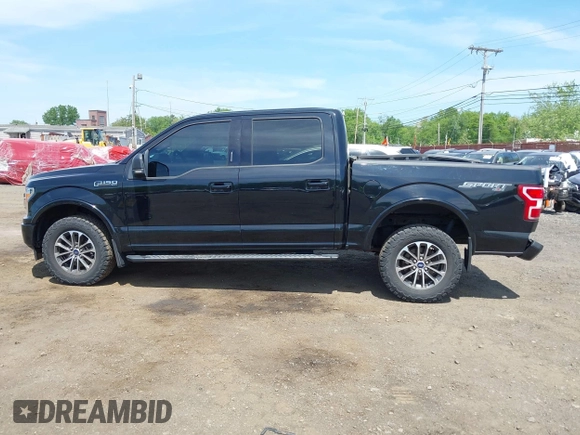 2018 Ford F-150 XL with VIN 1FTEW1EG0JFB61382, listed as a IAAI auction lot 42231412 with 101,376 mi miles and . Bid and sale history available at DreamBid. Image 14.