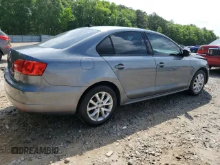 2011 Volkswagen Jetta SE with VIN 3VWDX7AJ2BM361210, listed as a Copart auction lot 53984825 with 223,915 mi miles and Salvage title. Bid and sale history available at DreamBid. Image 3.