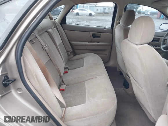 2006 Ford Taurus SE z VIN 1FAFP53U26A197294, wystawiony jako IAAI lot #41506334 z przebiegiem 180 411 mil mil oraz . Historia ofert i sprzedaży dostępna na DreamBid. Obrazek 8.