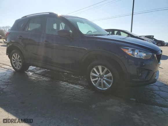 2014 Mazda CX-5 Touring with VIN JM3KE2CY9E0338230, listed as a Copart auction lot 50607655 with 124,749 mi miles and Salvage Title. Bid and sale history available at carsss.com. Image 4.