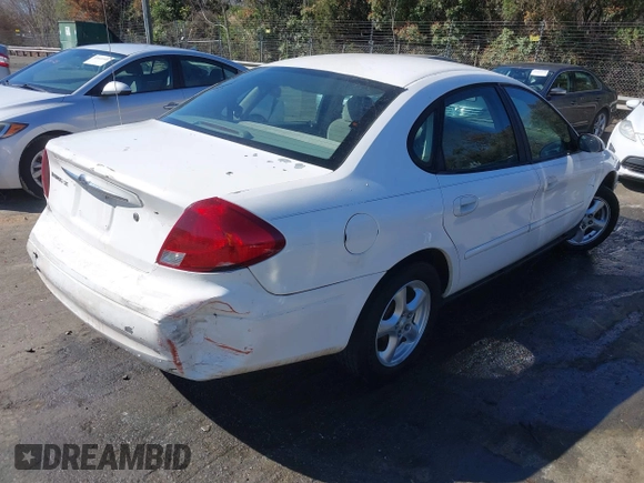 2003 Ford Taurus SE Standard with VIN 1FAFP53293G270314, listed as a IAAI auction lot 41840424 with 171,840 mi miles. Bid and sale history available at carsss.com. Image 4.