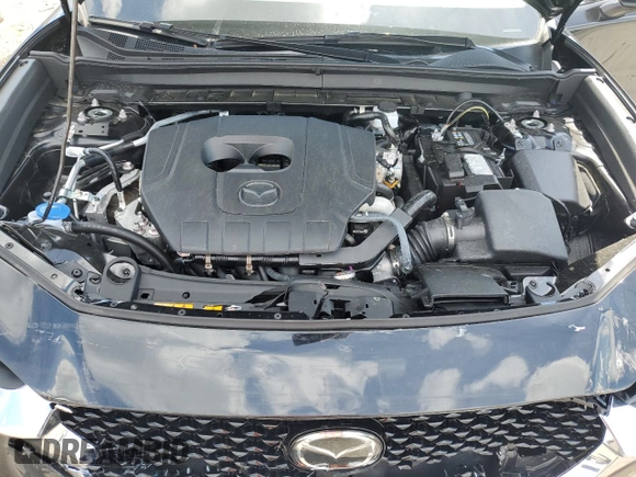 2025 Mazda CX-30 S Premium with VIN 3MVDMBDM3SM753468, listed as a Copart auction lot 55766585 with 3,051 mi miles and Salvage title. Bid and sale history available at DreamBid. Image 12.