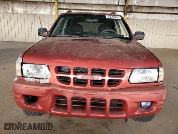 2000 Isuzu Rodeo S with VIN 4S2CK58W5Y4335051, listed as a Copart auction lot 83098034 with 236,390 mi miles and Salvage Title. Bid and sale history available at carsss.com. Image 5.