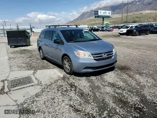 2012 Honda Odyssey EX-L with VIN 5FNRL5H6XCB041293, listed as a Copart auction lot 51707715 with 147,322 mi miles and Salvage Title. Bid and sale history available at carsss.com. Image 11.