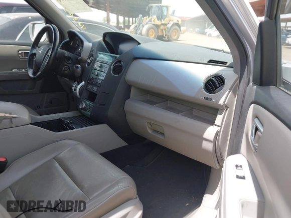 2011 Honda Pilot Touring z VIN 5FNYF3H90BB006634, wystawiony jako IAAI lot #42388390 z przebiegiem 218 475 mil mil oraz . Historia ofert i sprzedaży dostępna na DreamBid. Obrazek 5.