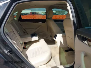 2013 Volkswagen Passat SEL Premium z VIN 1VWCN7A36DC122864, wystawiony jako IAAI lot #41818668 z przebiegiem 152 506 mil mil oraz . Historia ofert i sprzedaży dostępna na DreamBid. Obrazek 8.