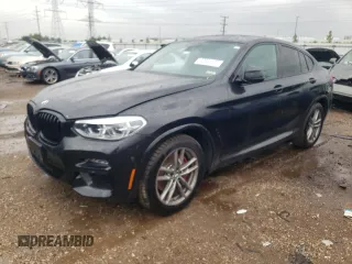 2021 BMW X4 M40i with VIN 5UX2V5C00M9H95699, listed as a Copart auction lot 63564433 with 33,500 mi miles and Salvage title. Bid and sale history available at DreamBid. Image 1.