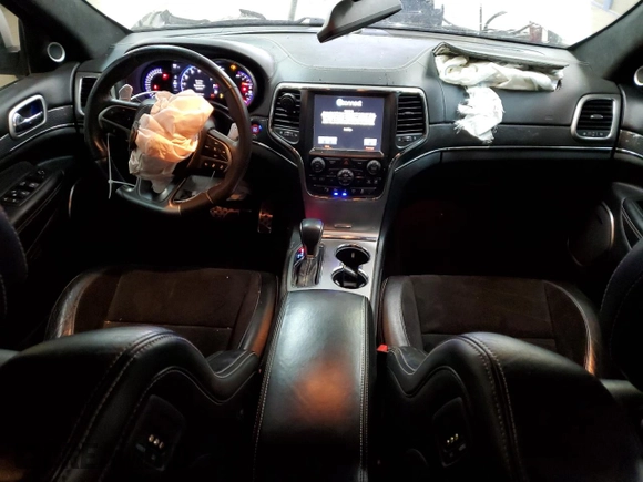 2017 Jeep Grand Cherokee SRT with VIN 1C4RJFDJ5HC939147, listed as a Copart auction lot 45664795 with 76,230 mi miles and Salvage Title. Bid and sale history available at carsss.com. Image 8.