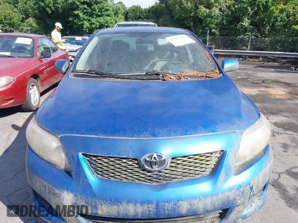 2010 Toyota Corolla with VIN 1NXBU4EE1AZ334617, listed as a IAAI auction lot 42177912 with 131,841 mi miles. Bid and sale history available at carsss.com. Image 6.