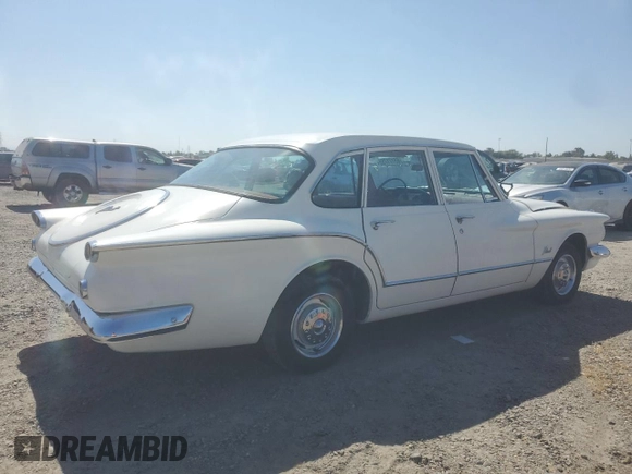 1960 Plymouth Valiant z VIN 1302156208, wystawiony jako Copart lot #65171755 z przebiegiem 84 776 mil mil oraz Czysty tytuł • Clean title. Historia ofert i sprzedaży dostępna na DreamBid. Obrazek 3.
