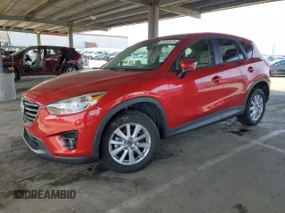 2016 Mazda CX-5 Touring z VIN JM3KE2CY4G0689839, wystawiony jako Copart lot #50050425 z przebiegiem 60 979 mil mil oraz Szkoda całkowita • Salvage title. Historia ofert i sprzedaży dostępna na DreamBid. Obrazek 1.
