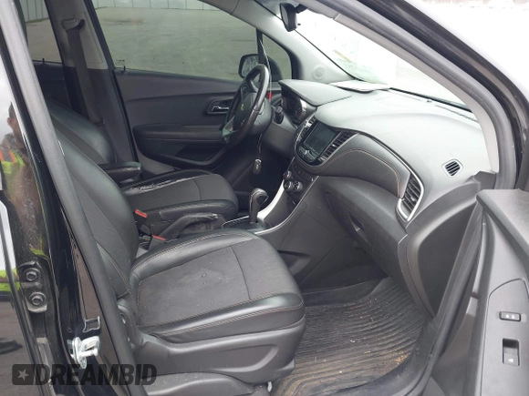 2020 Chevrolet Trax LT with VIN KL7CJLSBXLB003682, listed as a IAAI auction lot 41841753 with 114,624 mi miles and . Bid and sale history available at DreamBid. Image 5.