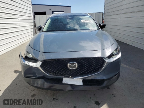 2025 Mazda CX-30 S Carbon Edition z VIN 3MVDMBCM2SM799150, wystawiony jako Copart lot #50815975 z przebiegiem 223 mil mil oraz Szkoda całkowita • Salvage title. Historia ofert i sprzedaży dostępna na DreamBid. Obrazek 5.