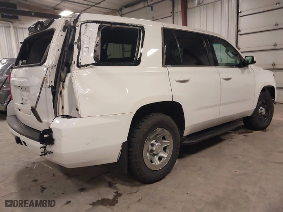 2015 Chevrolet Tahoe Commercial with VIN 1GNSK2EC5FR688820, listed as a IAAI auction lot 41444813 with 206,244 mi miles. Bid and sale history available at carsss.com. Image 4.