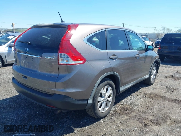 2014 Honda CR-V EX with VIN 2HKRM4H50EH628721, listed as a IAAI auction lot 42064143 with 103,009 mi miles and . Bid and sale history available at carsss.com. Image 4.