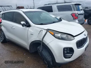 2018 Kia Sportage EX with VIN KNDPNCAC4J7409492, listed as a IAAI auction lot 42648009 with 97,787 mi miles and . Bid and sale history available at DreamBid. Image 1.
