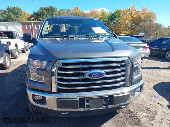 2015 Ford F-150 XLT with VIN 1FTEW1EF7FFB65198, listed as a IAAI auction lot 40509417 with 119,649 mi miles and . Bid and sale history available at DreamBid. Image 13.