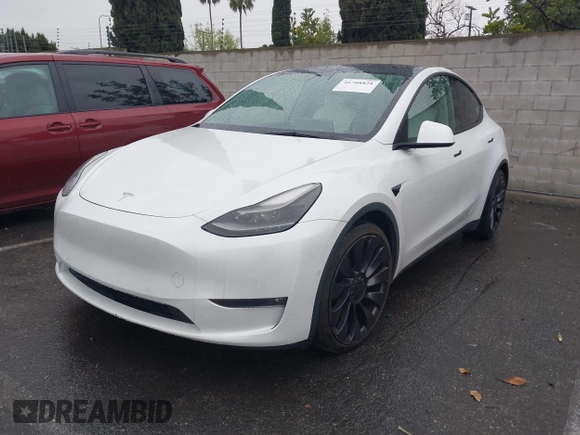 2021 Tesla Model Y Performance with VIN 5YJYGDEF2MF230374, listed as a IAAI auction lot 41708828 with 20,272 mi miles. Bid and sale history available at carsss.com. Image 6.