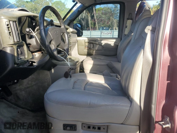 2005 Chevrolet Express Cargo Van YF7 Upfitter with VIN 1GBFG15T751154645, listed as a Copart auction lot 84732304 with 38,363 mi miles and Salvage Title. Bid and sale history available at carsss.com. Image 7.