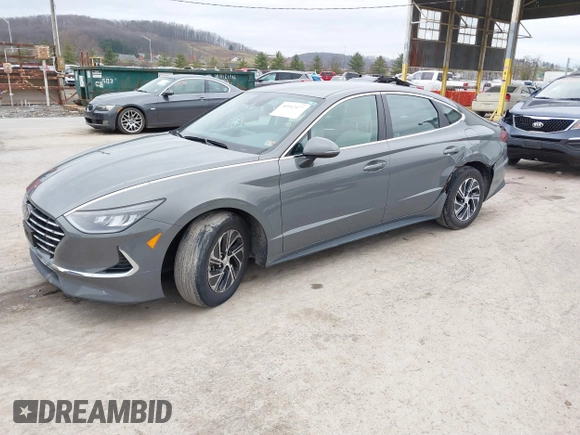 2022 Hyundai Sonata Hybrid Blue with VIN KMHL24JJ2NA048439, listed as a IAAI auction lot 40942477 with 64,855 mi miles. Bid and sale history available at carsss.com. Image 18.