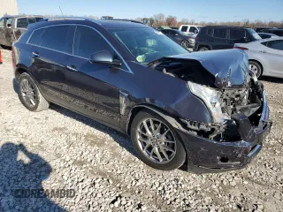 2016 Cadillac SRX Premium Collection with VIN 3GYFNDE37GS566174, listed as a Copart auction lot 83420924 with 80,559 mi miles and Salvage title. Bid and sale history available at DreamBid. Image 4.