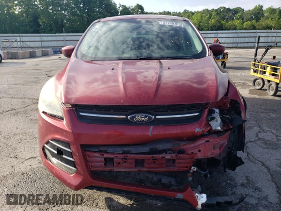 2013 Ford Escape SE with VIN 1FMCU0GX1DUB90907, listed as a Copart auction lot 57789785 with 113,525 mi miles and Salvage title. Bid and sale history available at DreamBid. Image 5.