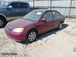 2003 Honda Civic EX with VIN 2HGES26743H513074, listed as a IAAI auction lot 41761316 with 186,019 mi miles. Bid and sale history available at carsss.com. Image 2.