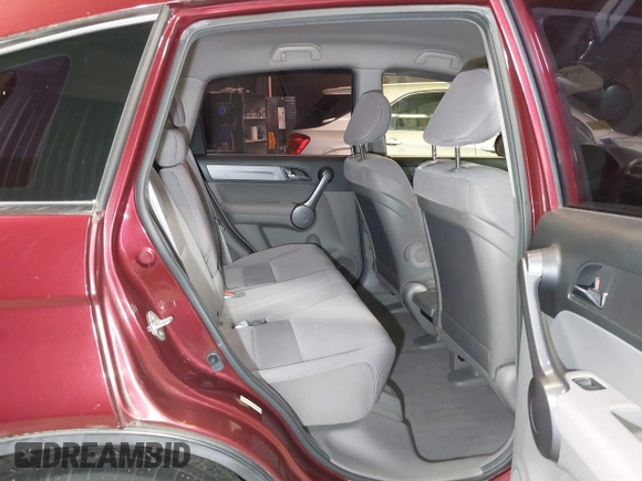 2009 Honda CR-V LX with VIN JHLRE48339C018957, listed as a IAAI auction lot 41952951 with 76,502 mi miles. Bid and sale history available at carsss.com. Image 8.