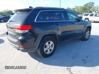 2014 Jeep Grand Cherokee Laredo with VIN 1C4RJEAG6EC136832, listed as a IAAI auction lot 42020647 with 151,639 mi miles. Bid and sale history available at carsss.com. Image 4.