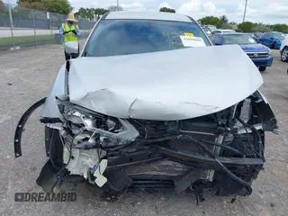 2017 Nissan Rogue SV with VIN KNMAT2MT1HP561144, listed as a IAAI auction lot 42010660 with 69,313 mi miles. Bid and sale history available at carsss.com. Image 13.