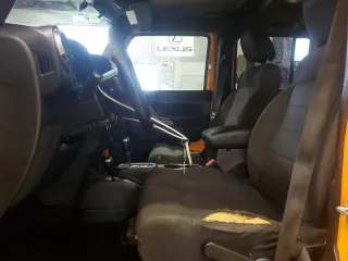 2012 Jeep Wrangler Unlimited Sport with VIN 1C4BJWDG1CL131876, listed as a Copart auction lot 56678175 with 217,109 mi miles and Clean title. Bid and sale history available at DreamBid. Image 7.